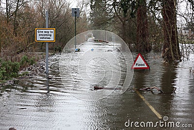 Flood sign in road Stock Photo