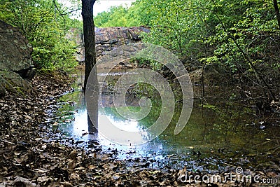 Flooded abandoned mine Stock Photo