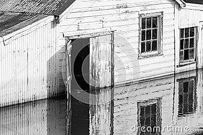 Flooded farm building Stock Photo