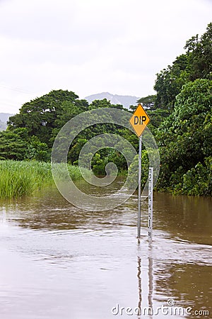 Flooded road in Queensland, Australia Stock Photo