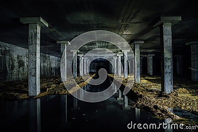 Flooded by sewage large abandoned underground cellar Stock Photo