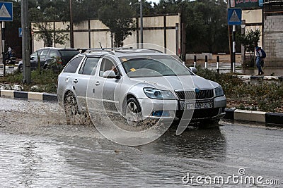 A flooded street during a rainy day in the town of Deir Al-Balah in the central Gaza Strip Editorial Stock Photo