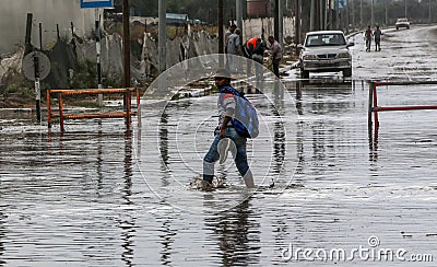 A flooded street during a rainy day in the town of Deir Al-Balah in the central Gaza Strip Editorial Stock Photo