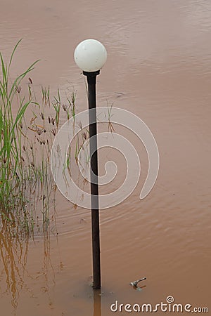 Flooding of outdoor power poles affected by flooding Stock Photo