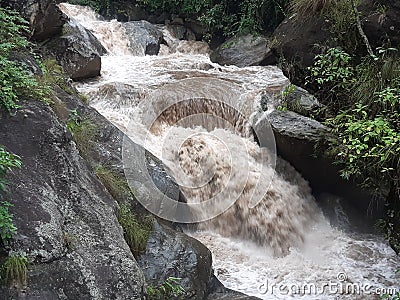 Flooding in waterfall in small river Stock Photo