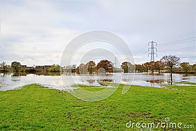 Symmetrical reflections in Fish Lake Farmland flooding 2; Doncaster, November, 2019; Stock Photo