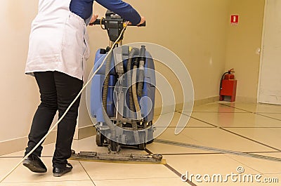 Floor care and cleaning services with washing machine Stock Photo