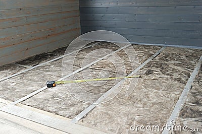 Floor insulation in a frame house Stock Photo
