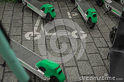 Floor marking or pictogram for electric scooter station. Drawing of a scooter on the floor to denote dedicated place to park Stock Photo