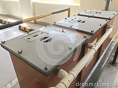Floor mounted three compartment Grease Interceptors to remove the Oils fats and Adhesive materials from the waste water coming Stock Photo