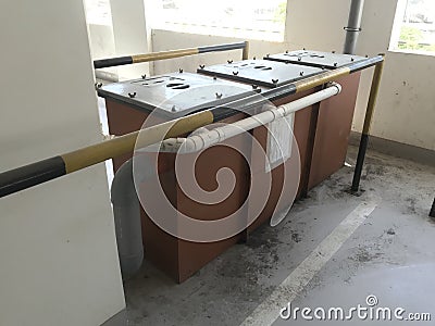 Floor mounted three compartment Grease Interceptors to remove the Oils fats and Adhesive materials from the waste water coming Stock Photo