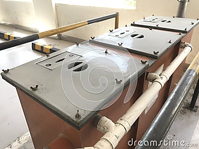 Floor mounted three compartment Grease Interceptors to remove the Oils fats and Adhesive materials from the waste water coming Stock Photo