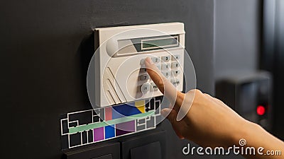Floor plan and switching lighting. The woman pressed the button. Stock Photo
