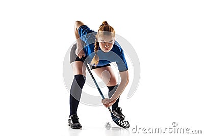 Floorball female player isolated on white studio background, action and motion concept Stock Photo