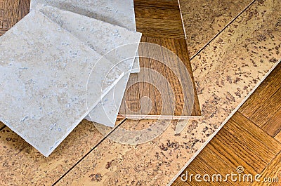 Flooring Sections of Wood Cork and Tile