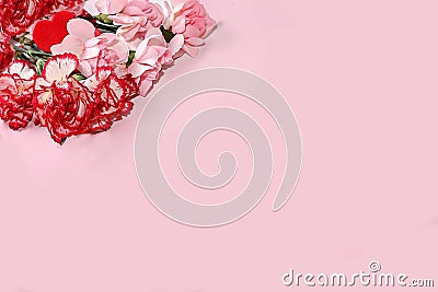 Floral arrangement with carnations on a pink background. Concept for Valentine's Day or Women's Day, Stock Photo