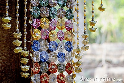 Floral decoration in buddhist temple. Cambodian temple internal floral decor. Buddhism festival decoration. Stock Photo