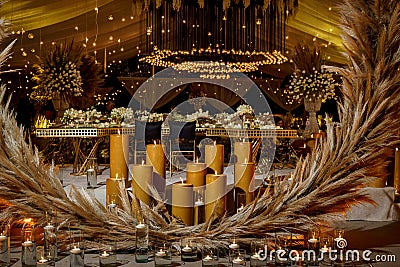 Floral decoration in wedding reception at night with candles Stock Photo