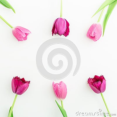 Floral frame with pink tulip flowers on white background. Flat lay. Top view. Valentines Day background. Stock Photo