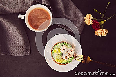 Floral hygge aesthetic - french tart, petals coffee among flowers flat lay. Stock Photo