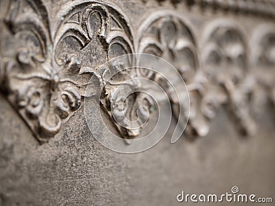 Floral pattern on a metal wall. Stock Photo
