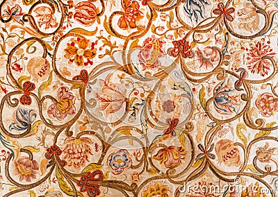 Floral patterns on painted textile from Sicily. Design of silk carpet from 17th century. Italian vintage Stock Photo