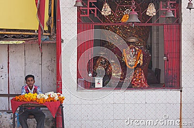 Floral tributes for sale at a Hindu shrine Editorial Stock Photo