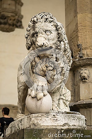 Florence, Italy - 23 April, 2018: a lion statue near Loggia dei Lanzi Editorial Stock Photo