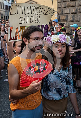 Close-up of two gay men, during the Toscana Pride LGBTQ parade. Editorial Stock Photo