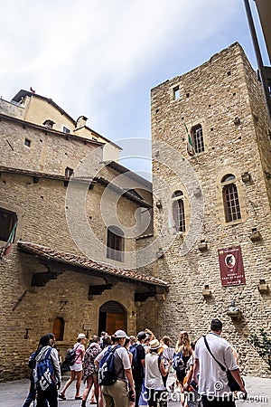 Tourists queued up waiting to visit the birth house of the Italian poet Dante Alighieri in Florence Editorial Stock Photo