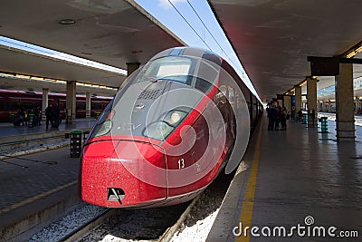 Head car of the high-speed train AGV Alstom of national carrier of NTV close up. Florence Editorial Stock Photo