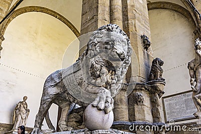 Florence lion statue at the Loggia dei Lanzi in Florence, Italy Editorial Stock Photo