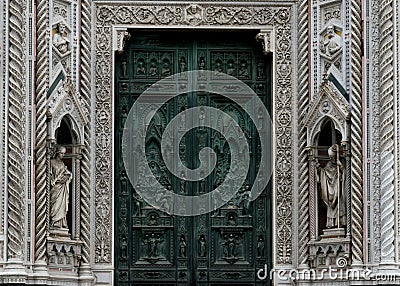 Florence& x27;s Cathedral, the Duomo - detail of the architecture and main door Editorial Stock Photo