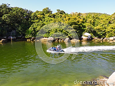 Couple on a watercraft at Lagoa da Conceicao Barra da Lagoa Editorial Stock Photo