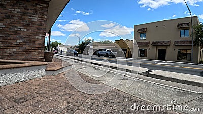 Florida Ave traffic puffy white clouds vintage buildings brick pavement Editorial Stock Photo