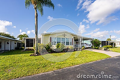 Florida style mobile home in a trailer park low income housing Stock Photo