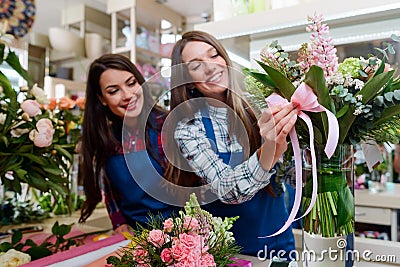 Florist decorates a bouquet Stock Photo