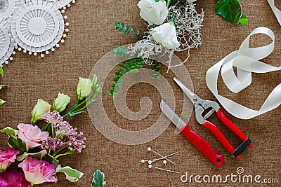 Florist workplace. Tools and accessories. Stock Photo