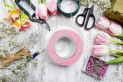 Florist workplace: woman making floral arrangements Stock Photo