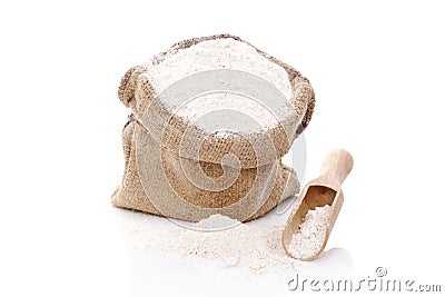 Flour in burlap bag. Stock Photo