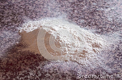 Flour on ceramic table Stock Photo