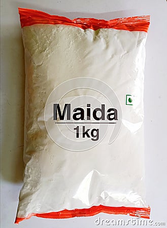 Flour or Maida one kilogram or kg in transparent packet for sale Stock Photo