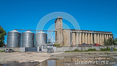 Flour mill grain elevators and railroad tracks - Poti, Georgia Stock Photo