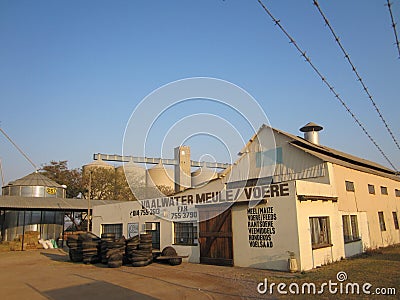 Flour Mill and silos in Africa Vector Illustration