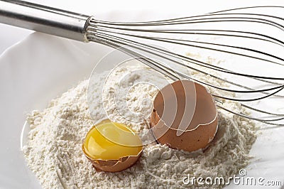 Flour, whisker and egg Stock Photo