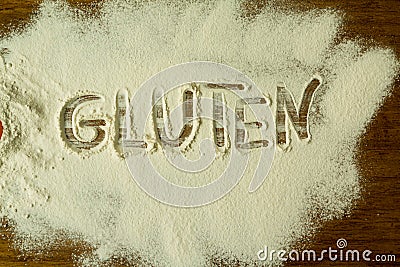 Flour with writted word GLUTEN Stock Photo