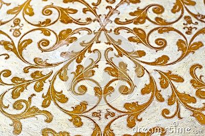 Gold flourish design ornament. Decorative white background. Stock Photo