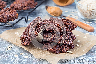 Flourless no bake peanut butter and oatmeal chocolate cookies on parchment, horizontal Stock Photo