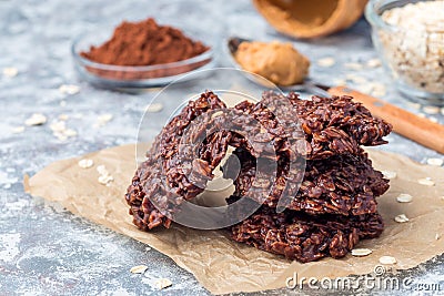 Flourless no bake peanut butter and oatmeal chocolate cookies on parchment, horizontal Stock Photo