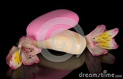 Flower of alstroemeria and two pieces soap Stock Photo